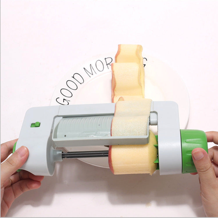 Hand rotating fruit and vegetable slicer